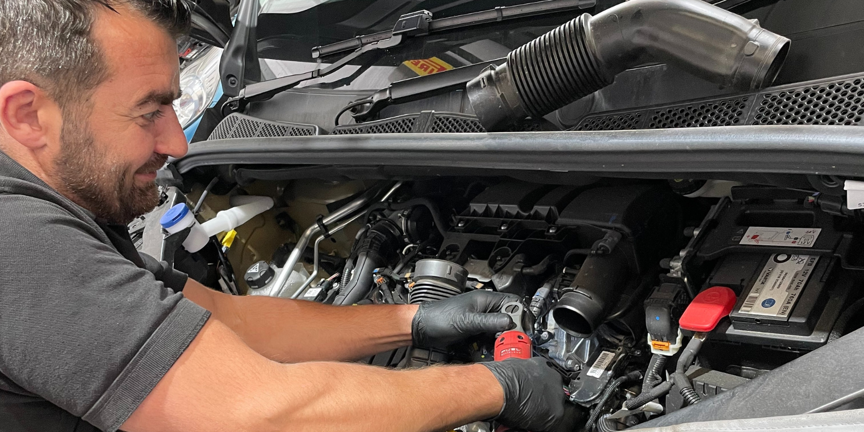 Mechanic Fixing Car